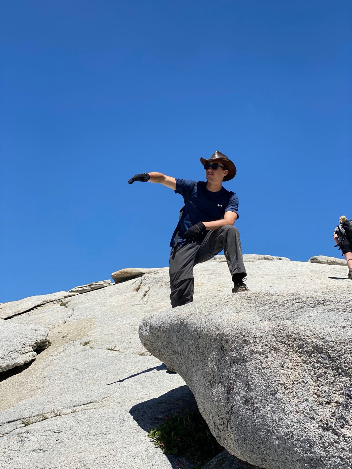 Rex Walrond on top of Half Dome in Yosemite National Park